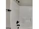 Clean bathroom featuring a shower and updated fixtures at 305 Mango Ct, Mcdonough, GA 30253