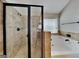 Beautiful bathroom with a glass shower and soaking tub at 305 Mango Ct, Mcdonough, GA 30253