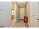 Inviting entryway features hardwood floors, neutral walls, and a view of the dining room beyond at 444 Silverbell Ct, Peachtree City, GA 30269