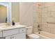 Bright powder room features a sleek vanity and modern fixtures at 444 Silverbell Ct, Peachtree City, GA 30269
