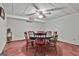 Basement featuring a round table, chairs, and decorative ceiling fan at 101 Longer Dr, Peachtree City, GA 30269