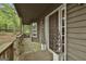 Charming front porch with detailed trim and wooded surroundings at 101 Longer Dr, Peachtree City, GA 30269