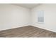 Bedroom with hardwood floors and a window at 235 Oliver Dr, Locust Grove, GA 30248
