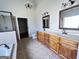 The main bathroom features a double vanity, separate shower, and large bathtub at 6504 Cedar Mountain Rd, Douglasville, GA 30134