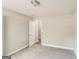 Neutral bedroom with carpet, open door, base trim, and access to other parts of the house at 121 Crestwood Ct, Hampton, GA 30228