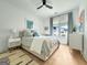 Bright bedroom with neutral colors, window and a soft rug on the floor at 300 Mado Ln # 329, Chattahoochee Hills, GA 30268