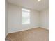 Comfortable bedroom with a window and plush carpeting at 3913 Landgraf Cv, Decatur, GA 30034