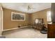 A bedroom with peeling paint on the walls and damaged carpeting at 2807 Knollview Dr, Decatur, GA 30034