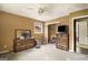 Bedroom with old furniture and peeling ceiling paint needing repair at 2807 Knollview Dr, Decatur, GA 30034
