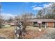 Cozy single-story brick home with inviting front access ramp and well-maintained yard at 2807 Knollview Dr, Decatur, GA 30034