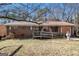 Classic brick home with convenient front access ramp, providing ease of entry and functionality at 2807 Knollview Dr, Decatur, GA 30034