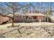 Single-story brick home with front access ramp, offering accessibility and convenience at 2807 Knollview Dr, Decatur, GA 30034