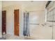 Bathroom shower with shower curtain and grab bar at 2807 Knollview Dr, Decatur, GA 30034