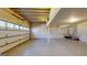 Unfinished basement with garage door access and exposed ceiling at 2897 Macaw Nw St, Atlanta, GA 30318