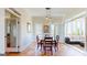 Bright dining room featuring tile floors and access to the outdoor patio at 2897 Macaw Nw St, Atlanta, GA 30318