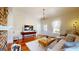 Beautiful living room with hardwood floors, brick fireplace, large windows and comfortable seating at 2897 Macaw Nw St, Atlanta, GA 30318