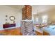 Bright living room with hardwood floors, decorative fire place and view to the front door at 2897 Macaw Nw St, Atlanta, GA 30318