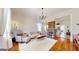Bright living room with hardwood floors, a brick fireplace, and stylish furnishings at 2897 Macaw Nw St, Atlanta, GA 30318