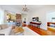 Spacious living room featuring hardwood floors, brick fireplace and an open floor plan at 2897 Macaw Nw St, Atlanta, GA 30318