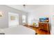 Bright main bedroom with a decorative fireplace and hardwood floors at 2897 Macaw Nw St, Atlanta, GA 30318