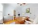 Well-lit home office with a classic wooden desk, ample storage, and neutral decor at 2897 Macaw Nw St, Atlanta, GA 30318