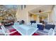 Expansive patio area with a grill, dining set, lounge seating, and outdoor heater at 2897 Macaw Nw St, Atlanta, GA 30318