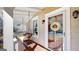 Relaxing front porch with a hanging swing, decorative front door and stained wood flooring at 2897 Macaw Nw St, Atlanta, GA 30318