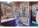 Rustic bathroom with shiplap and metal walls, plus a modern vanity and fixtures at 80 David Rd, Hampton, GA 30228