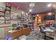 Garage with eclectic decor, seating area, and tv at 80 David Rd, Hampton, GA 30228