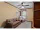 Relaxing living room with a plaid sofa and recliner at 80 David Rd, Hampton, GA 30228