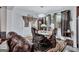 Charming breakfast nook featuring a rustic table set for dining and views of the backyard at 3259 Baylor Cir, Mcdonough, GA 30253