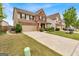 Traditional two-story home featuring a brick facade, well-kept lawn, and long driveway at 3259 Baylor Cir, Mcdonough, GA 30253