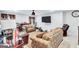Comfortable living room with a TV, sofa, side tables, and accent lighting for a relaxed atmosphere at 3259 Baylor Cir, Mcdonough, GA 30253