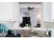 View from the kitchen of the Gathering room showing the seamless connectivity for easy interaction and living at 416 Line Creek Cir, Sharpsburg, GA 30277