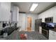 Well-equipped kitchen includes stainless appliances and great access to the laundry and other rooms at 416 Line Creek Cir, Sharpsburg, GA 30277