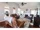 Spacious living room with hardwood floors, a fireplace, and neutral paint at 416 Line Creek Cir, Sharpsburg, GA 30277