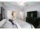 Spacious main bedroom features a tray ceiling, with ample natural light at 416 Line Creek Cir, Sharpsburg, GA 30277