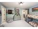 Charming bedroom with a themed decor, bunk beds, a beanbag, and lots of storage space at 106 Tullamore Trl, Tyrone, GA 30290
