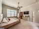 Serene bedroom with natural light and plush carpeting at 106 Tullamore Trl, Tyrone, GA 30290
