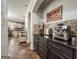Coffee bar area with granite countertops and stainless steel appliances at 106 Tullamore Trl, Tyrone, GA 30290