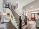 View of the staircase and entry at 106 Tullamore Trl, Tyrone, GA 30290