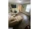 Inviting living room with modern flooring, comfortable seating and bright natural light at 5172 Avery Sw St, Covington, GA 30014
