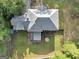 Overhead shot showcases the home, large yard, and deck, highlighting the outdoor living space and property layout at 5045 Rock Springs Rd, Lithonia, GA 30038