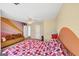 Whimsical bedroom features colorful design elements including custom paint, and natural light at 5045 Rock Springs Rd, Lithonia, GA 30038