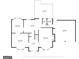 Detailed first-floor layout with dimensions of the living room, dining room, kitchen, and garage at 5045 Rock Springs Rd, Lithonia, GA 30038