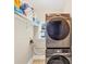 Laundry room featuring stainless steel washer and dryer units at 5045 Rock Springs Rd, Lithonia, GA 30038