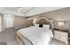 Spacious main bedroom with tray ceiling, carpet floors, ample space, and large windows at 5045 Rock Springs Rd, Lithonia, GA 30038