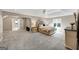 Spacious main bedroom with tray ceiling, carpet floors, ample space, ensuite bath and large windows at 5045 Rock Springs Rd, Lithonia, GA 30038