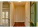 Inviting entryway featuring wood-look flooring and a view into the home's living area at 7017 Sun Valley Way, Riverdale, GA 30274