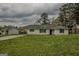 Charming single-story brick home with green shutters and a well-maintained lawn at 7017 Sun Valley Way, Riverdale, GA 30274